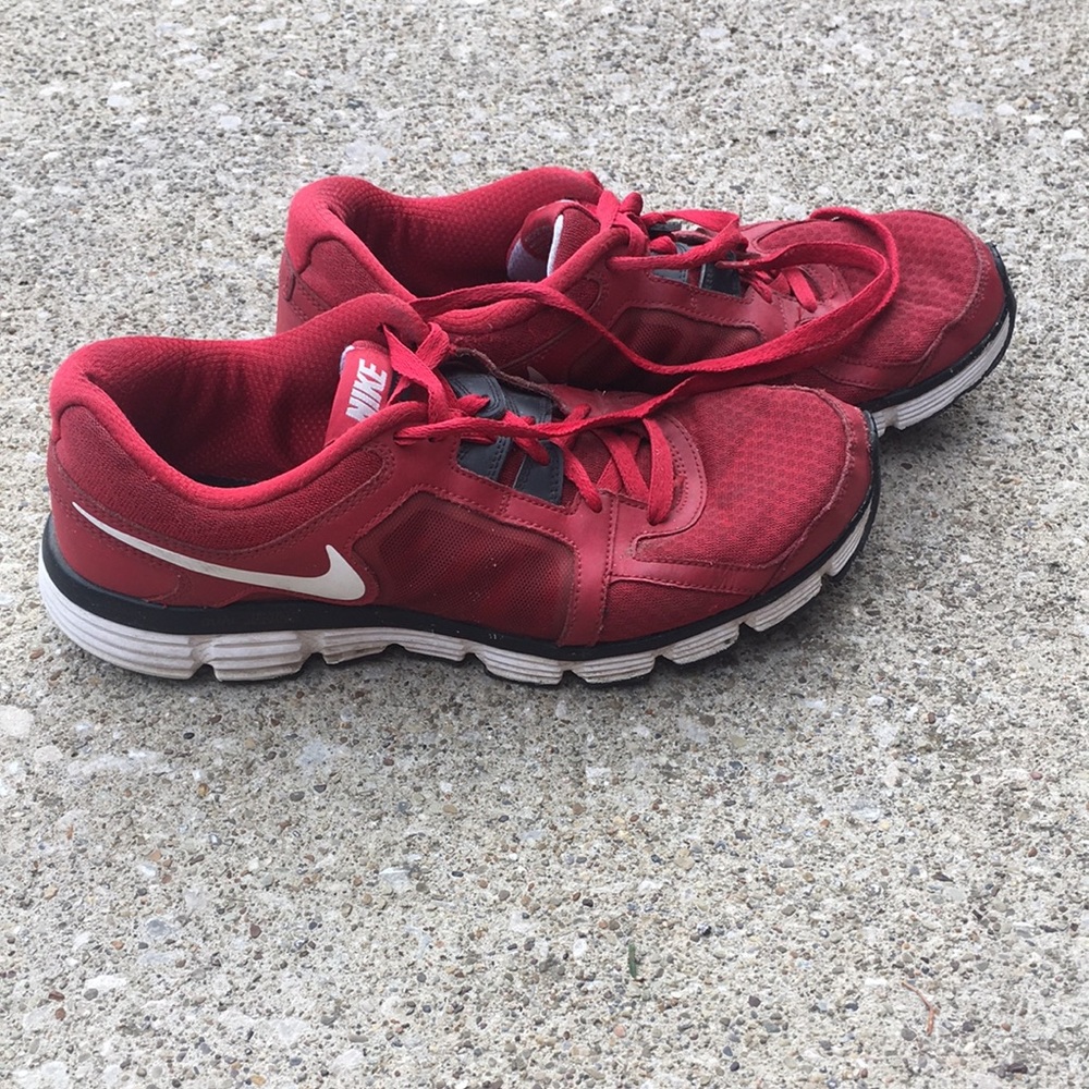 Red Nike tennis shoes